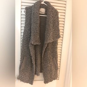 Long sleeveless sweater